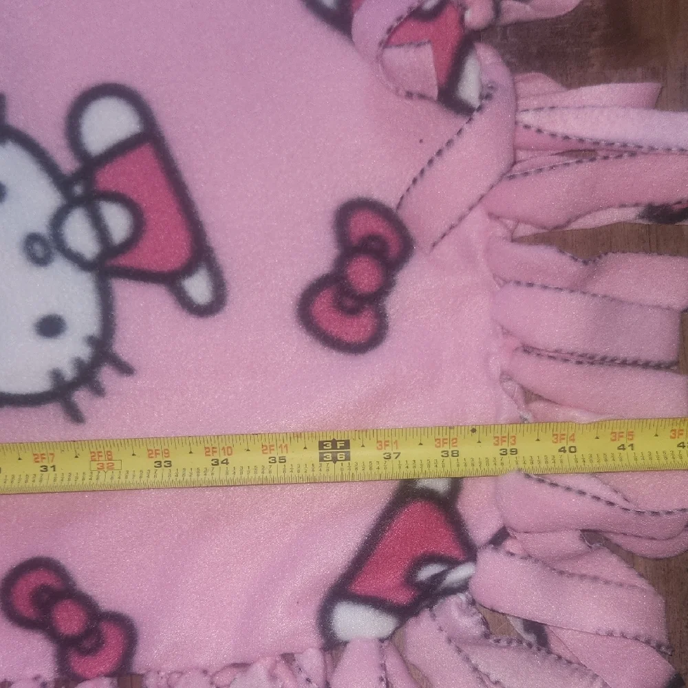 Hello Kitty Pink Fleece Tie-Blanket with Bow Graphic